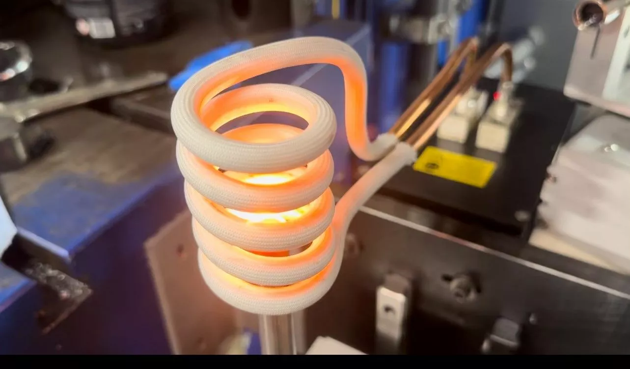 induction heated coil to replace flame torch forging